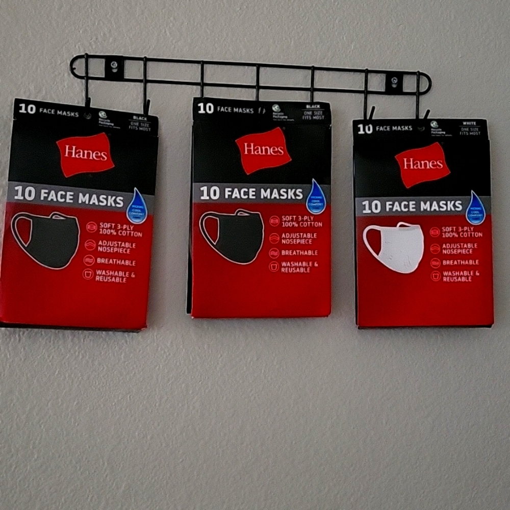 NEW...solid Black and solid white 10 pk of  face masks... $13.00 A PACK